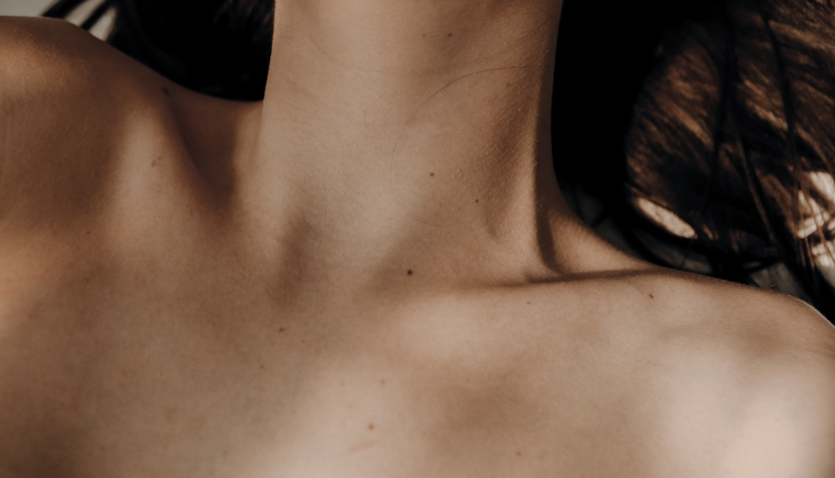 Close-up of a person's neck and clavicles